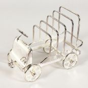 A CLASSIC OPEN CAR FOUR-DIVISION TOAST RACK.