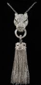 A SILVER CARTIER DESIGN PANTHER PENDANT AND CHAIN.