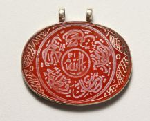 AN EGYPTIAN OVAL PENDANT.
