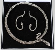 A SILVER AND MARCASITE SNAKE NECKLACE AND EARRINGS.