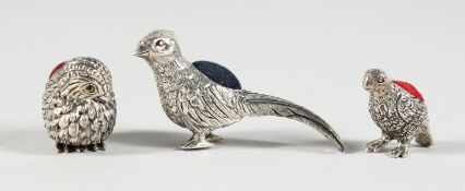 THREE CAST SILVER NOVELTY BIRD PIN CUSHIONS.