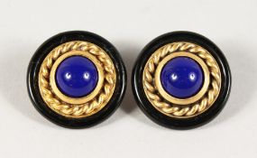 A PAIR OF YSL BLUE AND GILT EAR CLIPS.