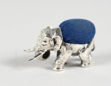 A CAST SILVER ELEPHANT PIN CUSHION.