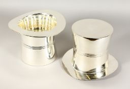 A PAIR OF SILVER PLATE TOP HAT WINE COOLERS. 6.5ins high.
