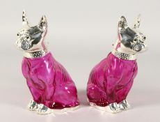 A PAIR OF CRANBERRY FRENCH BULLDOG CLARET JUGS with plated head, collar and base. 8ins high.