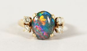 A 14CT GOLD, BLACK OPAL AND DIAMOND RING.