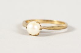 A 9CT GOLD PEARL RING.