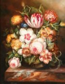 20th century British school, A still life of flowers in a glass vase on a marble ledge, oil on