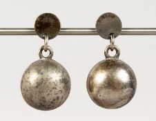 A PAIR OF SILVER EARRINGS.