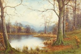 Edward Horace Thompson. An Autumnal scenic river landscape with mountains on the horizon,