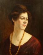 Henry Childe Pocock (1854-1934) British, A bust length portrait of a Lady in a necklace, oil on