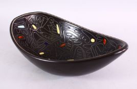 AN UNSUAL ISRAEL POTTERY BOWL, with carved decoration, the base marked israel lapid, 30cm x 18cm