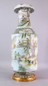 A LARGE 19TH CENTURY CHINESE FAMILLE VERTE / ROSE PORCELAIN VASE, decorated with scenes of working