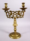 A 19TH CENTURY BRONZE JEWISH CANDLESTICK, with beast openwork, 37cm x 27cm