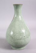 AN 18TH / 19TH CENTURY CHINESE LONGQUAN CELADON PORCELAIN VASE, with floral carved decoration,