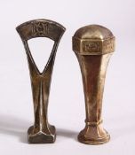 TWO ISLAMIC WHITE METAL SEAL STAMPS, both with carved bottom, 8.5cm & 8cm.