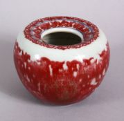 A CHINESE COPPER RED GLAZE PORCELAIN BRUSH WAS, the base with a six character kangxi mark, 7cm.