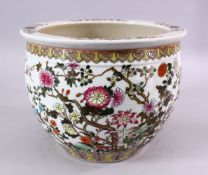 A 19TH / 20TH CENTURY CHINESE FAMILLE ROSE PORCELAIN JARDINIERE, decorated with native displays of