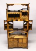 A JAPANESE MEIJI PERIOD EXOTIC WOOD INLAID OPEN SHELF CABINET, with an array of exotic inlaid