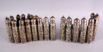 A 19TH CENTURY INDIAN / ISLAMIC EMBOSSED WHITE METAL BELT, with moulded decoration and sectional,