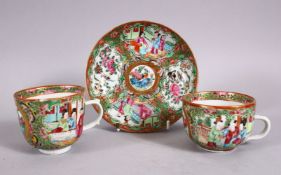 A 19TH CENTURY CHINESE FAMILLE ROSE CANTON CUPS & SAUCER, decorated with panels of birds and flora &