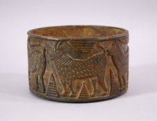 AN EARLY GHANDARA STONE CARVED ANIMAL POT - 14cm