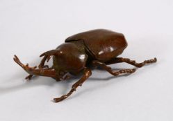 A JAPANESE BRONZE FIGURE OF A STAG BEETLE, The back opening for storage, 9cm