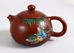 A CHINESE YIXING CLAY ENAMEL DECORATED TEA POT, decorated with a figure fishing, the base with ana