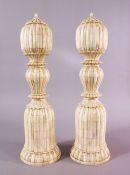 A LARGE PAIR OF 19TH CENTURY INDIAN CARVED IVORY FINIALS, of sectional form , 44cm high x 13cm