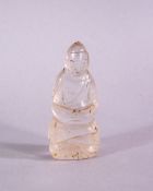 A 19TH CENTURY THAI CARVED ROCK CRYSTAL FIGURE OF SEATED BUDDHA, 5.2cm high.