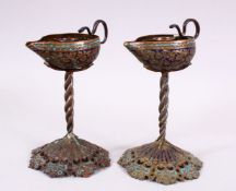 A PAIR OF 19TH CENTURY ISLAMIC KASHMIRI ENAMEL CANDLESTICKS, formed as pourers, with openwork bases,