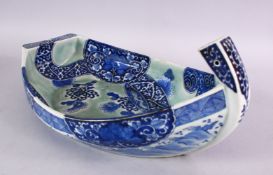 A JAPANESE MEIJI PERIOD ARITA TAKARABUNE FORMED BLUE & WHITE PORCELAIN DISH, decorated interior with