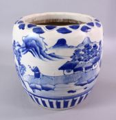 A 19TH CENTURY CHINESE BLUE & WHITE PORCELAIN JAR / JARDINIERE, decorated with views of buildings in