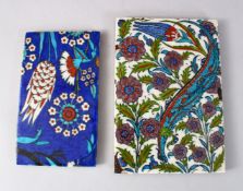 TWO GOOD ISLAMIC IZNIK POTTERY TILES, Both decorated with flora, one upon blue ground, one with a