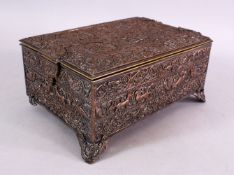 A 19TH CENTURY ISLAMIC / PERSIAN WHITE METAL HEAVY LIDDED BOX, with decoration of figures, animals