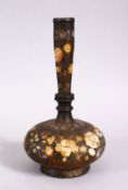 A 19TH CENTURY ISLAMIC KASHMIRI PAPIER MACHE VASE, with painted decoration of flora, 19cm