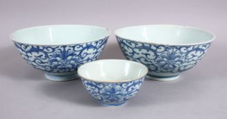 A LOT OF THREE 19TH CENTURY CHINESE BLUE & WHITE PORCELAIN BOWLS, each decorated with formal