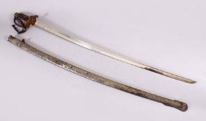 A JAPANESE MEIJI PERIOD PARADE SWORD WITH SILVER FAMILY CREST, the hilt with a silver onlaid crest