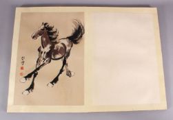 A CHINESE BOOK OF PAINTED / INK WORK HORSE ILLUSTRATIONS SIGNED XU BEIHONG - the book containing