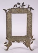 AN ISLAMIC PERSIAN STYLE WHITE METAL PICTURE FRAME, with decoration of ram, 19.5cm x 12cm .
