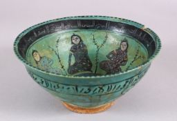 A 12TH - 14TH CENTURY PERSIAN POTTERY BOWL, the interior with figures seated, and bands of