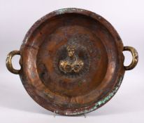 A ROMAN / GREEK STYLE BRONZE FIGURAL RELIEF CHARGER, with twin handles and a relief figure, and
