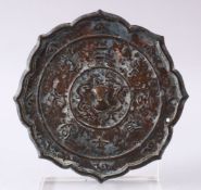 A GOOD 19TH CENTURY OR EARLIER CHINESE BRONZE TANG STYLE MIRROR, with archaic calligraphy and