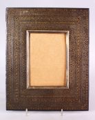 A 19TH CENTURY INDIAN GOLD INLAID STEEL PHOTO FRAME, 29cm X 23cm.
