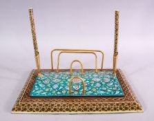 A PERSIAN MICRO MOSAIC & ENAMEL DESK STAND, with enamel decoration depicting flora upon turquoise