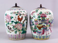 TWO 19TH CENTURY CHINESE FAMILLE ROSE PORCELAIN GINGER JARS & COVERS, each decorated with profuse