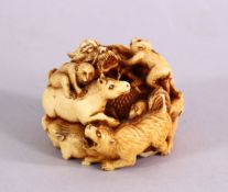 A JAPANESE MEIJI PERIOD CARVED IVORY ZODIAC BALL OKIMONO - With carved animals including, dragon,