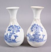 A PAIR OF JAPANESE MEIJI PERIOD BLUE & WHITE HIRADO PORCELAIN VASES, each decorated with floral