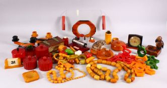 A VERY LARGE COLLECTION OF BAKELITE / CHERRY AMBER ITEMS, consisting of bead necklaces,