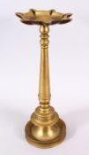 A 16TH / 17TH CENTURY INDIAN TIBETAN BRONZE OIL LAMP, carved with a lower band of calligraphy,